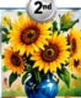Bright yellow sunflowers in ceramic vase