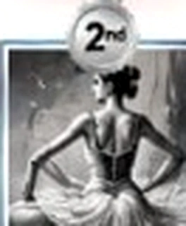 Ballerina seated on floor adjusting pointe shoes