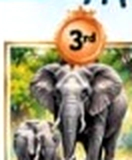 Elephant herd emerging from forest foliage